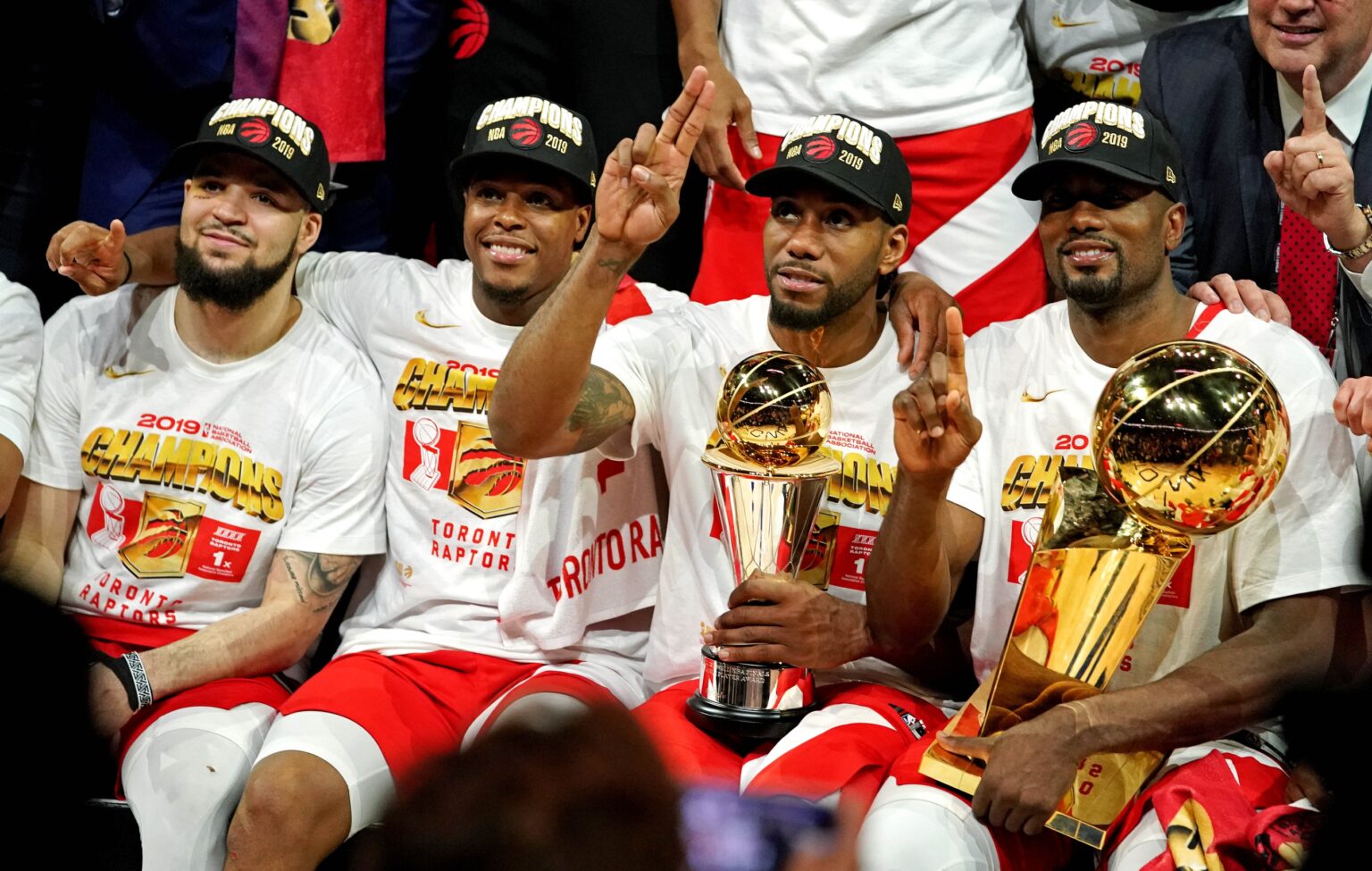 Jun 13, 2019; Oakland, CA, USA; Toronto Raptors guard Fred VanVleet (23), guard Kyle Lowry (7), forward Kawhi Leonard (2) and center Serge Ibaka (9) celebrates after beating the Golden State Warriors in game six of the 2019 NBA Finals at Oracle Arena. Mandatory Credit: Kyle Terada-USA TODAY Sports