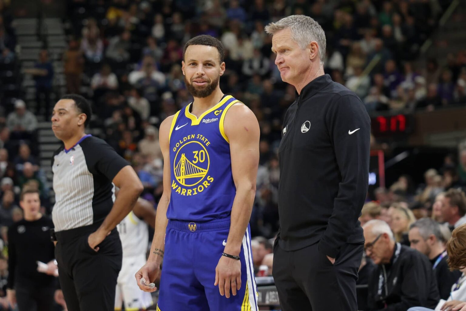 Feb 15, 2024; Salt Lake City, Utah, USA; Golden State Warriors guard Stephen Curry (30) and head coach Steve Kerr talk on the sideline during the first quarter against the Utah Jazz at Delta Center. Mandatory Credit: Chris Nicoll-Imagn Images