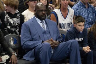 May 28, 2024; Dallas, Texas, USA; Shaquille O'Neal watches the game between the Dallas Mavericks and the Minnesota Timberwolves in game four of the western conference finals for the 2024 NBA playoffs at American Airlines Center. Mandatory Credit: Jerome Miron-Imagn Images