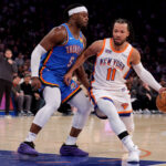 Jan 10, 2025; New York, New York, USA; New York Knicks guard Jalen Brunson (11) drives to the basket against Oklahoma City Thunder guard Luguentz Dort (5) during the third quarter at Madison Square Garden. Mandatory Credit: Brad Penner-Imagn Images