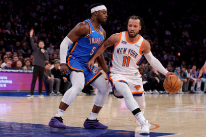 Jan 10, 2025; New York, New York, USA; New York Knicks guard Jalen Brunson (11) drives to the basket against Oklahoma City Thunder guard Luguentz Dort (5) during the third quarter at Madison Square Garden. Mandatory Credit: Brad Penner-Imagn Images