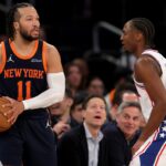 Feb 26, 2025; New York, New York, USA; New York Knicks guard Jalen Brunson (11) looks to in bound the ball against Philadelphia 76ers guard Tyrese Maxey (0) during the fourth quarter at Madison Square Garden. Mandatory Credit: Brad Penner-Imagn Images