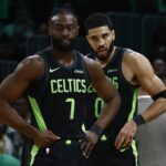 Feb 28, 2025; Boston, Massachusetts, USA; Boston Celtics guard Jaylen Brown (7) and forward Jayson Tatum (0) stand on the court during a timeout during the second half of their loss to the Cleveland Cavaliers at TD Garden. Mandatory Credit: Winslow Townson-Imagn Images
