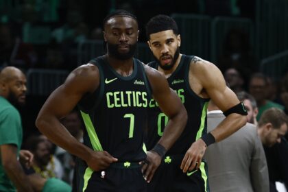 Feb 28, 2025; Boston, Massachusetts, USA; Boston Celtics guard Jaylen Brown (7) and forward Jayson Tatum (0) stand on the court during a timeout during the second half of their loss to the Cleveland Cavaliers at TD Garden. Mandatory Credit: Winslow Townson-Imagn Images