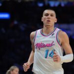 Mar 25, 2025; Miami, Florida, USA; Miami Heat guard Tyler Herro (14) looks on against the Golden State Warriors during the third quarter at Kaseya Center. Mandatory Credit: Sam Navarro-Imagn Images