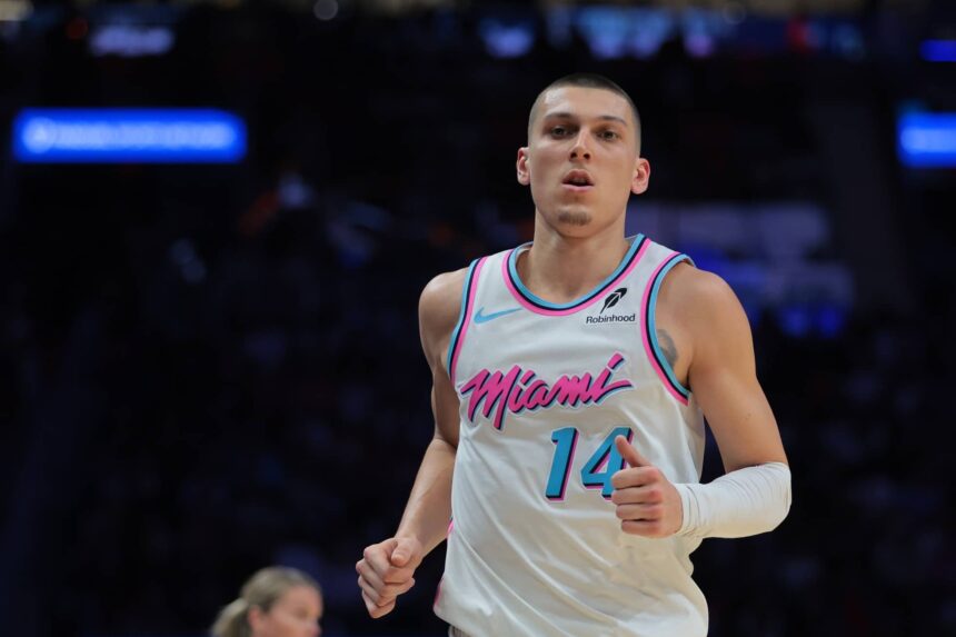 Mar 25, 2025; Miami, Florida, USA; Miami Heat guard Tyler Herro (14) looks on against the Golden State Warriors during the third quarter at Kaseya Center. Mandatory Credit: Sam Navarro-Imagn Images