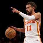 Apr 10, 2025; Brooklyn, New York, USA; Atlanta Hawks guard Trae Young (11) controls the ball against the Brooklyn Nets during the third quarter at Barclays Center. Mandatory Credit: Brad Penner-Imagn Images