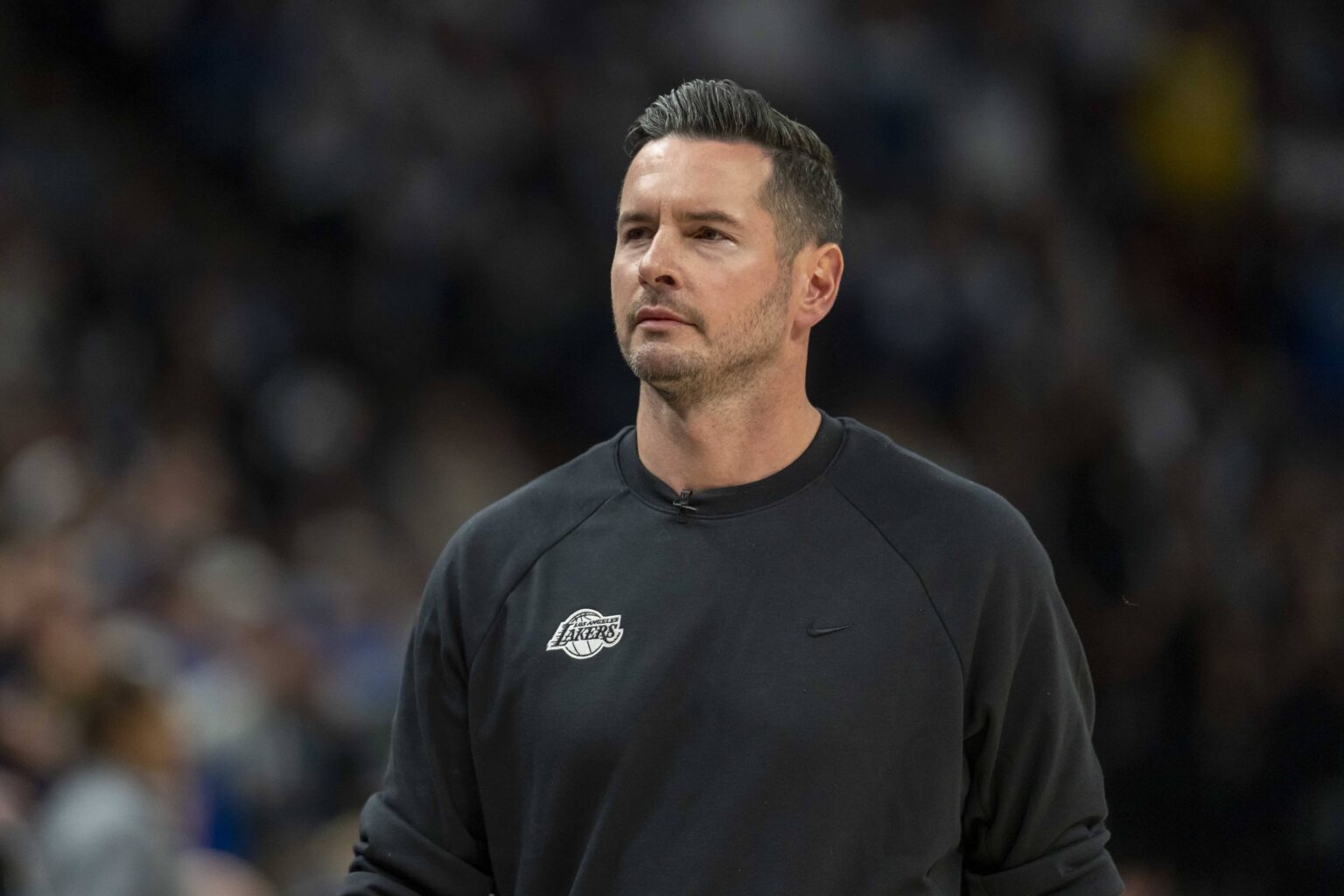 Apr 25, 2025; Minneapolis, Minnesota, USA; Los Angeles Lakers head coach JJ Redick looks on against the Minnesota Timberwolves in the first half during game three of first round for the 2024 NBA Playoffs at Target Center. Mandatory Credit: Jesse Johnson-Imagn Images