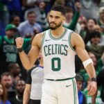 Apr 27, 2025; Orlando, Florida, USA; Boston Celtics forward Jayson Tatum (0) reacts after beating the Orlando Magic in game four of first round for the 2025 NBA Playoffs at Kia Center. Mandatory Credit: Nathan Ray Seebeck-Imagn Images