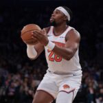 Oct 17, 2025; New York, New York, USA; New York Knicks forward Guerschon Yabusele (28) shoots the ball during the second half against the Charlotte Hornets at Madison Square Garden. Mandatory Credit: Vincent Carchietta-Imagn Images