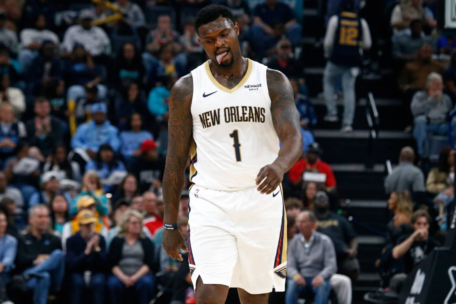 Oct 22, 2025; Memphis, Tennessee, USA; New Orleans Pelicans forward Zion Williamson (1) reacts during the first quarter against the Memphis Grizzlies at FedExForum. Mandatory Credit: Petre Thomas-Imagn Images