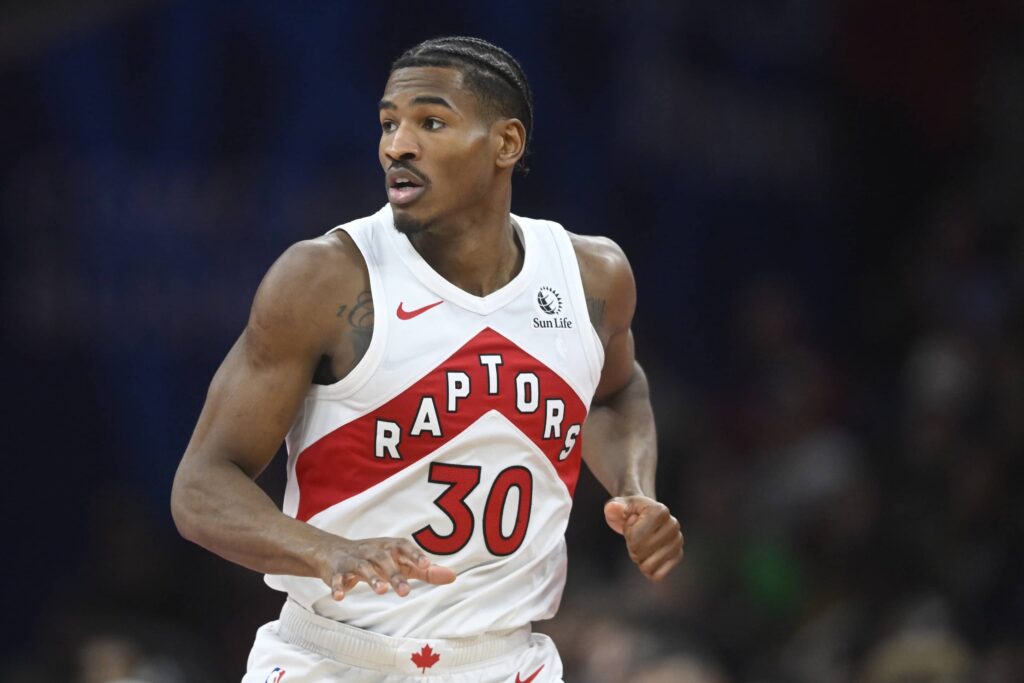 Oct 31, 2025; Cleveland, Ohio, USA; Toronto Raptors guard Ochai Agbaji (30) runs on the court in the third quarter against the Cleveland Cavaliers at Rocket Arena. Mandatory Credit: David Richard-Imagn Images