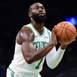 Nov 3, 2025; Boston, Massachusetts, USA; Boston Celtics guard Jaylen Brown (7) shoots a free throw during the first half against the Utah Jazz at TD Garden. Mandatory Credit: Bob DeChiara-Imagn Images