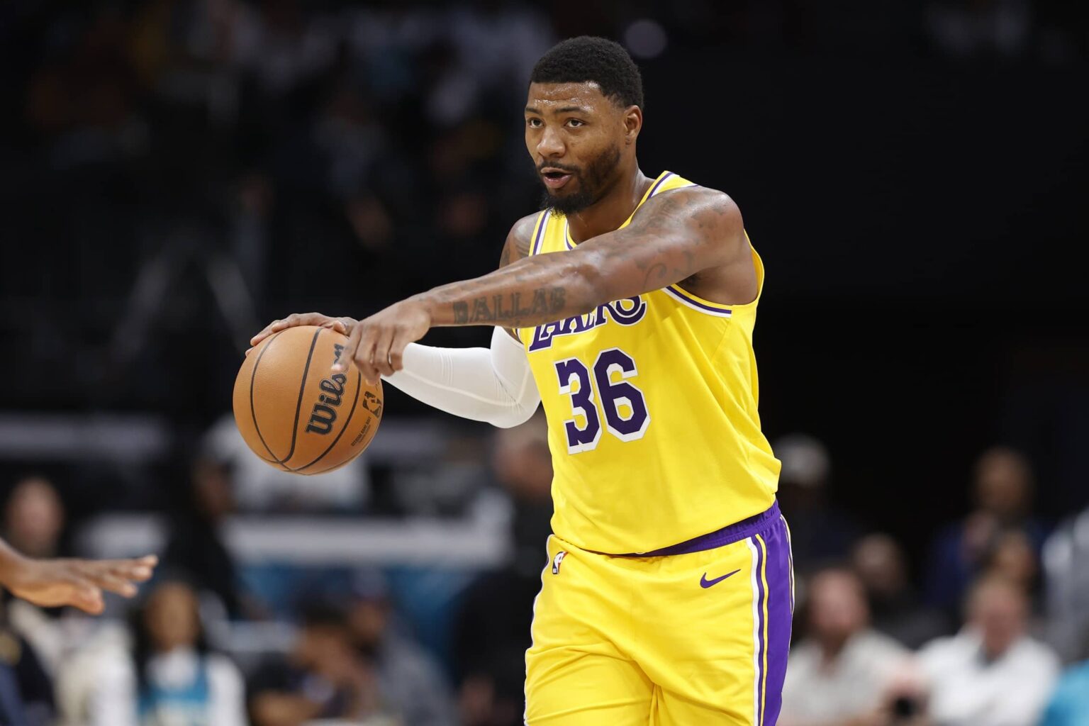 Nov 10, 2025; Charlotte, North Carolina, USA; Los Angeles Lakers guard Marcus Smart (36) directs the offense during the second quarter against the Charlotte Hornets at Spectrum Center. Mandatory Credit: Brian Westerholt-Imagn Images