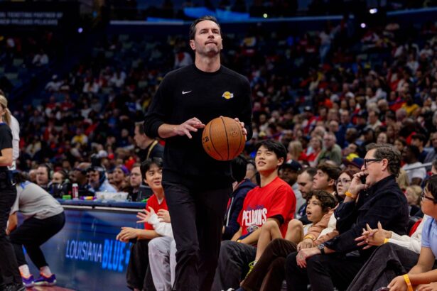 Nov 14, 2025; New Orleans, Louisiana, USA; Los Angeles Lakers Head Coach JJ Redick looks on against the New Orleans Pelicans during the first half at Smoothie King Center. Mandatory Credit: Stephen Lew-Imagn Images