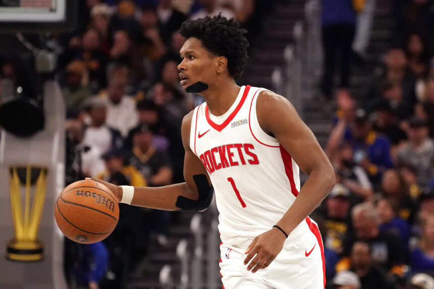 Nov 26, 2025; San Francisco, California, USA; Houston Rockets guard-forward Amen Thompson (1) dribbles upcourt against the Golden State Warriors in the third quarter at Chase Center. Mandatory Credit: David Gonzales-Imagn Images