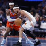 Nov 28, 2025; Oklahoma City, Oklahoma, USA;Oklahoma City Thunder guard Shai Gilgeous-Alexander (2) forces Phoenix Suns guard Devin Booker (1) to turn over the ball during the second half at Paycom Center. Mandatory Credit: Alonzo Adams-Imagn Images