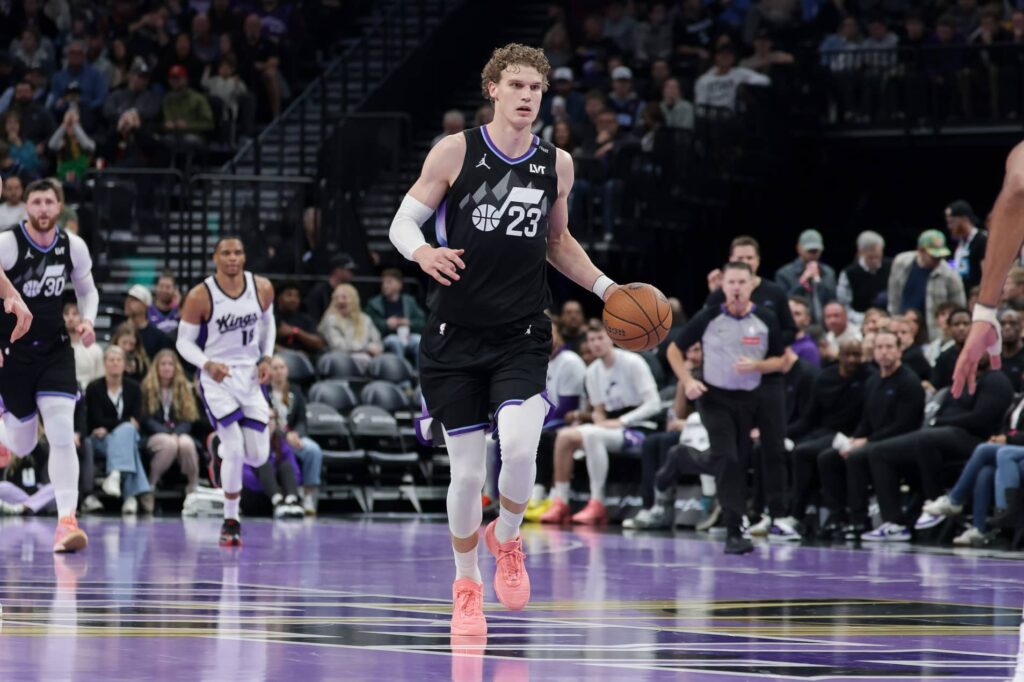 Nov 28, 2025; Salt Lake City, Utah, USA; Utah Jazz forward Lauri Markkanen (23) brings the ball up the court against the Sacramento Kings during the second half at Delta Center. Mandatory Credit: Chris Nicoll-Imagn Images