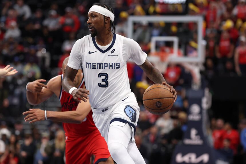Nov 28, 2025; Inglewood, California, USA; Memphis Grizzlies guard Kentavious Caldwell-Pope (3) drives to the basket during the fourth quarter against the Los Angeles Clippers at Intuit Dome. Mandatory Credit: Kiyoshi Mio-Imagn Images
