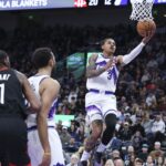 Nov 30, 2025; Salt Lake City, Utah, USA; Utah Jazz guard Keyonte George (3) lays the ball up against the Houston Rockets during the first quarter at Delta Center. Mandatory Credit: Rob Gray-Imagn Images