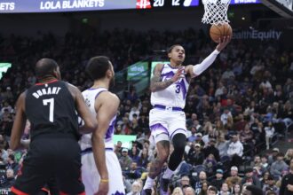 Nov 30, 2025; Salt Lake City, Utah, USA; Utah Jazz guard Keyonte George (3) lays the ball up against the Houston Rockets during the first quarter at Delta Center. Mandatory Credit: Rob Gray-Imagn Images