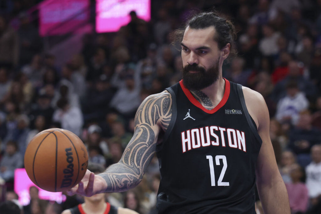 Nov 30, 2025; Salt Lake City, Utah, USA; Houston Rockets center Steven Adams (12) reacts to a foul call for the Utah Jazz during the third quarter at Delta Center. Mandatory Credit: Rob Gray-Imagn Images