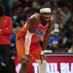 Nov 30, 2025; Portland, Oregon, USA; Oklahoma City Thunder guard Shai Gilgeous-Alexander (2) smiles at a fan during the second half in a game against the Portland Trail Blazers at Moda Center. Mandatory Credit: Troy Wayrynen-Imagn Images