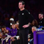 Nov 30, 2025; Los Angeles, California, USA; Los Angeles Lakers head coach JJ Redick watches game action against the New Orleans Pelicans during the first half at Crypto.com Arena. Mandatory Credit: Gary A. Vasquez-Imagn Images