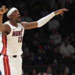 Dec 1, 2025; Miami, Florida, USA; Miami Heat center Bam Adebayo (13) celebrates a three-pointer during the first half against the Los Angeles Clippers at Kaseya Center. Mandatory Credit: Jim Rassol-Imagn Images