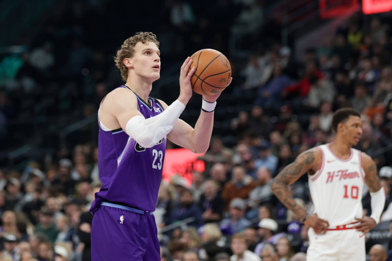 Dec 1, 2025; Salt Lake City, Utah, USA; Utah Jazz forward Lauri Markkanen (23) shoots a technical free throw against the Houston Rockets during the first quarter at Delta Center. Mandatory Credit: Chris Nicoll-Imagn Images