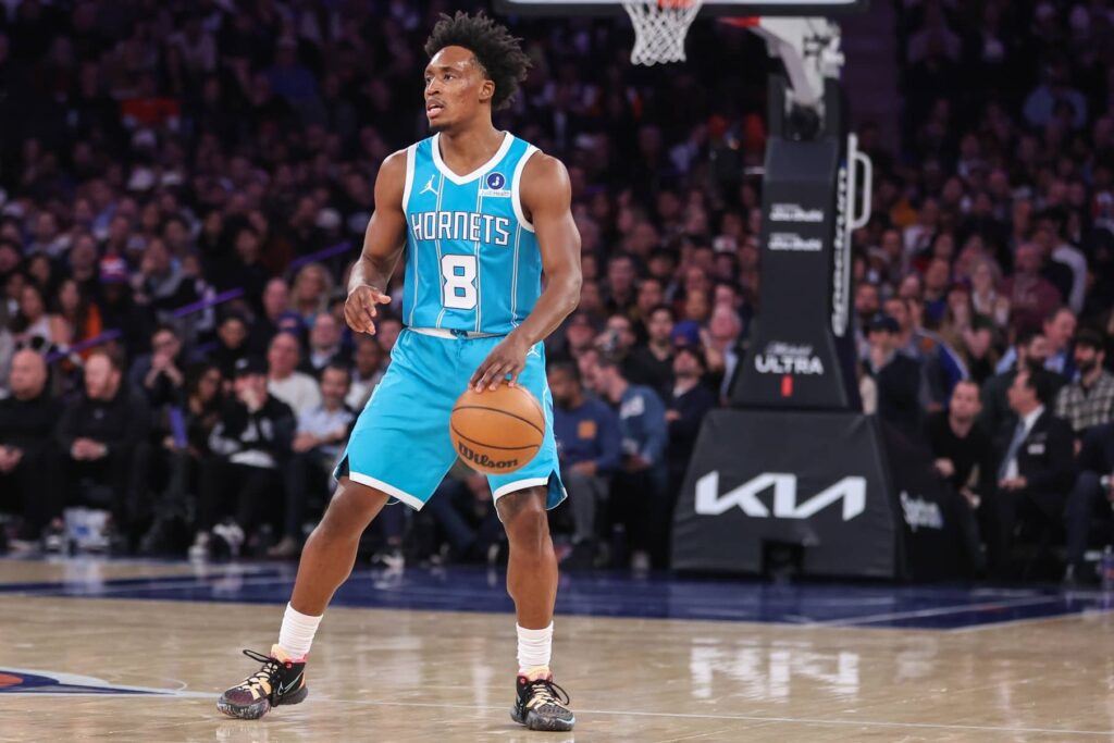 Dec 3, 2025; New York, New York, USA; Charlotte Hornets guard Collin Sexton (8) dribbles in the second quarter against the New York Knicks at Madison Square Garden. Mandatory Credit: Wendell Cruz-Imagn Images