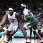 Dec 3, 2025; Milwaukee, Wisconsin, USA; Detroit Pistons forward Isaiah Stewart (28) drives to the basket against Milwaukee Bucks forward Bobby Portis (9) in the second half and was later ejected in the second half at Fiserv Forum. Mandatory Credit: Michael McLoone-Imagn Images