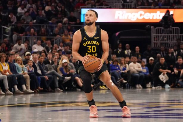 Nov 26, 2025; San Francisco, California, USA; Golden State Warriors guard Stephen Curry (30) shoots a three-pointer against the Houston Rockets in the second quarter at Chase Center. Mandatory Credit: David Gonzales-Imagn Images
