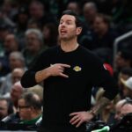 Dec 5, 2025; Boston, Massachusetts, USA; Los Angeles Lakers head coach JJ Redick signals to his players during the first half against the Boston Celtics at TD Garden. Mandatory Credit: Winslow Townson-Imagn Images