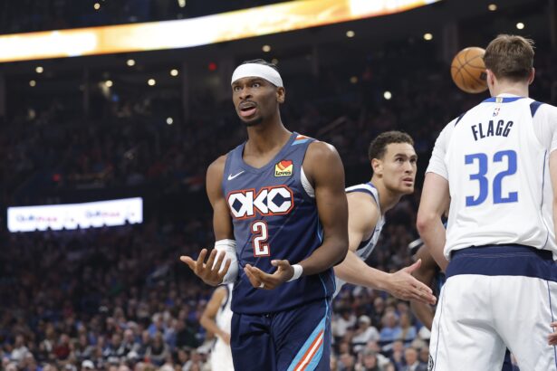 Dec 5, 2025; Oklahoma City, Oklahoma, USA; Oklahoma City Thunder guard Shai Gilgeous-Alexander (2) reacts after a call against him following a defensive play against the Dallas Mavericks during the second quarter at Paycom Center. Mandatory Credit: Alonzo Adams-Imagn Images