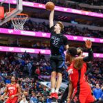 Dec 6, 2025; Dallas, Texas, USA; Dallas Mavericks forward Cooper Flagg (32) dunks during the fourth quarter against the Houston Rockets at American Airlines Center. Mandatory Credit: Andrew Dieb-Imagn Images