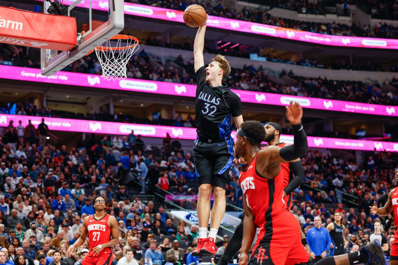 Dec 6, 2025; Dallas, Texas, USA; Dallas Mavericks forward Cooper Flagg (32) dunks during the fourth quarter against the Houston Rockets at American Airlines Center. Mandatory Credit: Andrew Dieb-Imagn Images