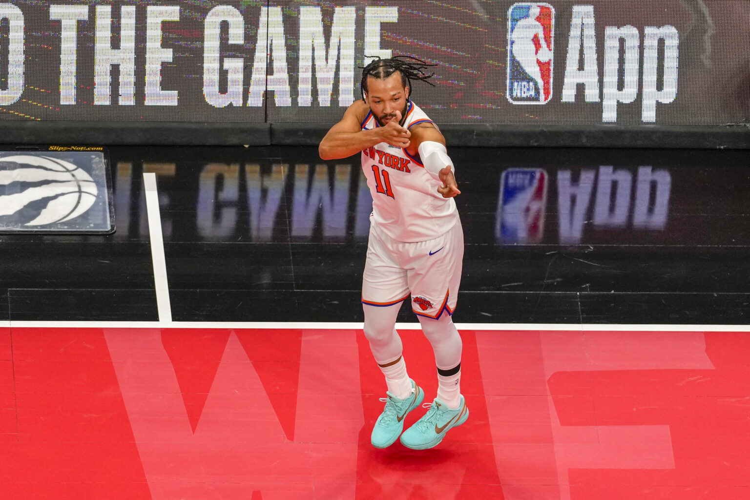 Dec 9, 2025; Toronto, Ontario, CAN; New York Knicks guard Jalen Brunson (11) reacts after scoring against the Toronto Raptors during the first half at the 2025-26 NBA Emirates Cup at Scotiabank Arena. Mandatory Credit: Kevin Sousa-Imagn Images
