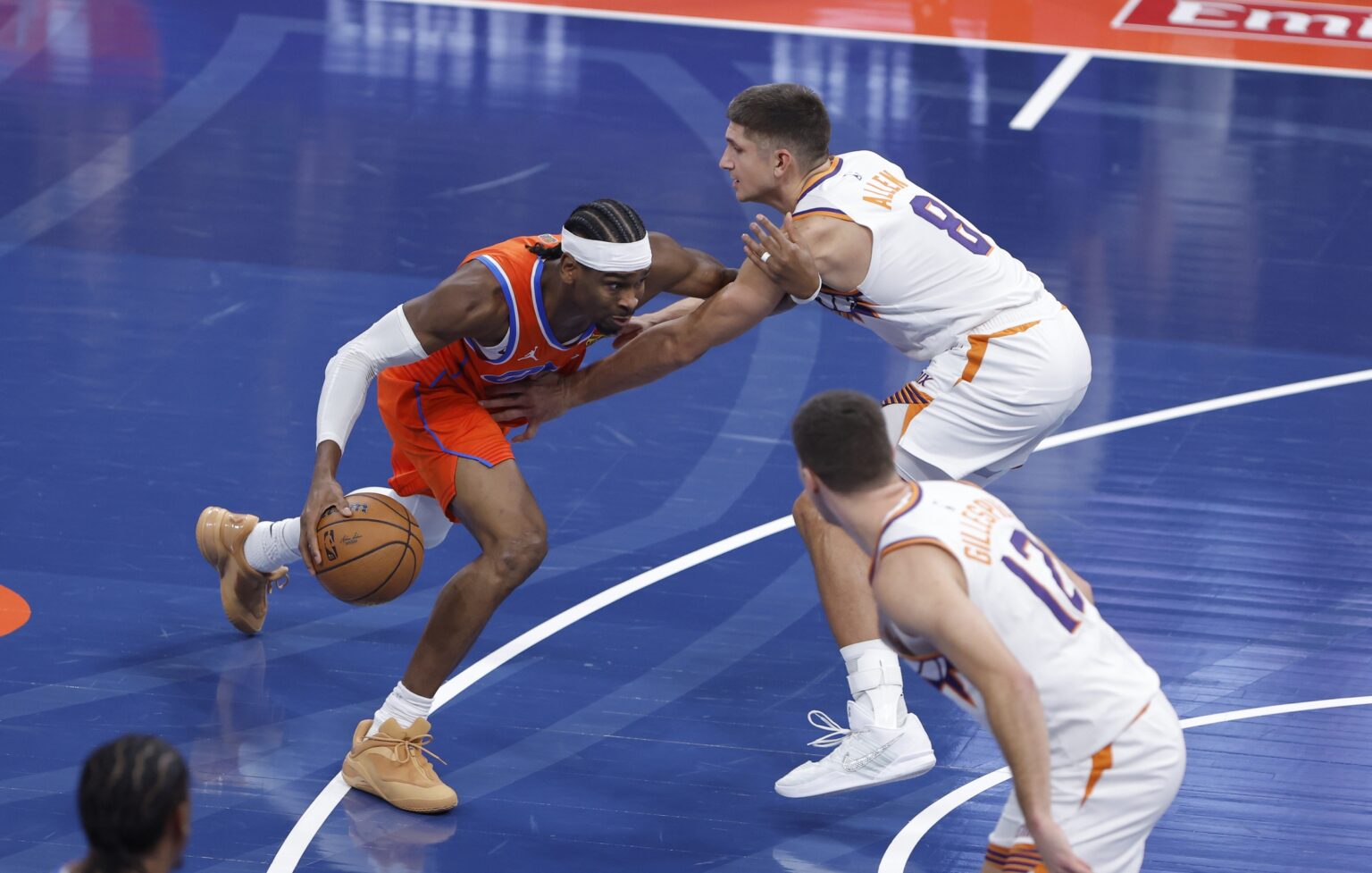 Dec 10, 2025; Oklahoma City, Oklahoma, USA; Oklahoma City Thunder guard Shai Gilgeous-Alexander (2) moves the ball past Phoenix Suns guard Grayson Allen (8) during the first quarter at Paycom Center. Mandatory Credit: Alonzo Adams-Imagn Images