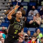 Dec 11, 2025; New Orleans, Louisiana, USA; New Orleans Pelicans forward Herbert Jones (2) reacts to making a basket against the Portland Trail Blazers during the first half at Smoothie King Center. Mandatory Credit: Stephen Lew-Imagn Images