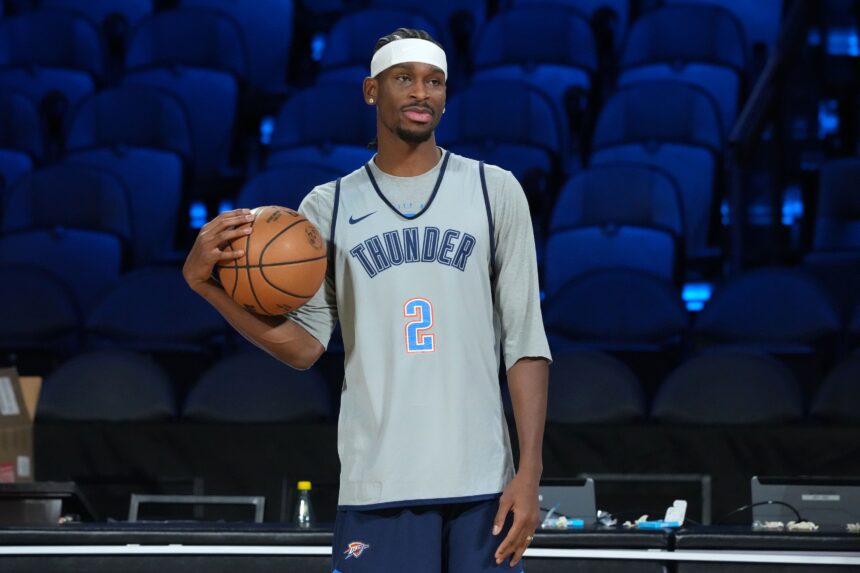Dec 12, 2025; Las Vegas, NV, USA; Oklahoma City Thunder guard Shai Gilgeous-Alexander (2) reacts during practice prior to the Emirates Cup semifinals at T-Mobile Arena. Mandatory Credit: Kirby Lee-Imagn Images