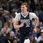 Dec 12, 2025; Dallas, Texas, USA; Dallas Mavericks forward Cooper Flagg (32) runs back up the court during the second half against the Brooklyn Nets at the American Airlines Center. Mandatory Credit: Jerome Miron-Imagn Images