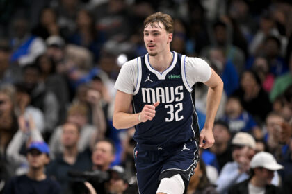 Dec 12, 2025; Dallas, Texas, USA; Dallas Mavericks forward Cooper Flagg (32) runs back up the court during the second half against the Brooklyn Nets at the American Airlines Center. Mandatory Credit: Jerome Miron-Imagn Images