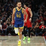 Dec 14, 2025; Portland, Oregon, USA; Golden State Warriors guard Stephen Curry (30) reacts after making a three-point basket against the Portland Trail Blazers during the second half at Moda Center. Mandatory Credit: Jaime Valdez-Imagn Images