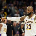 Dec 14, 2025; Phoenix, Arizona, USA; Los Angeles Lakers forward LeBron James (23) reacts after a foul during the second half of a game against the Phoenix Suns at Mortgage Matchup Center. Mandatory Credit: Allan Henry-Imagn Images