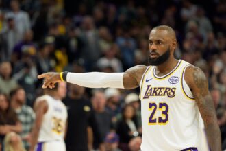 Dec 14, 2025; Phoenix, Arizona, USA; Los Angeles Lakers forward LeBron James (23) reacts after a foul during the second half of a game against the Phoenix Suns at Mortgage Matchup Center. Mandatory Credit: Allan Henry-Imagn Images