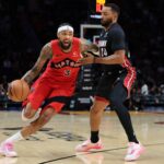 Dec 15, 2025; Miami, Florida, USA; Toronto Raptors forward Brandon Ingram (3) drives to the basket against Miami Heat guard Norman Powell (24) during the second quarter at Kaseya Center. Mandatory Credit: Sam Navarro-Imagn Images