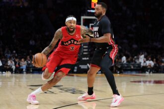 Dec 15, 2025; Miami, Florida, USA; Toronto Raptors forward Brandon Ingram (3) drives to the basket against Miami Heat guard Norman Powell (24) during the second quarter at Kaseya Center. Mandatory Credit: Sam Navarro-Imagn Images