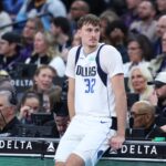 Dec 15, 2025; Salt Lake City, Utah, USA; Dallas Mavericks forward Cooper Flagg (32) waits to check in to the game against the Utah Jazz during the second half at Delta Center. Mandatory Credit: Rob Gray-Imagn Images