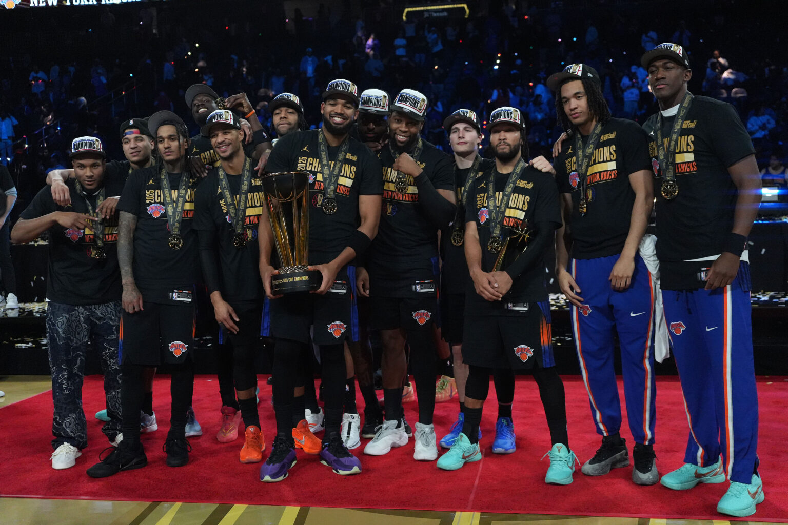 Dec 16, 2025; Las Vegas, Nevada, USA; The New York Knicks pose for a photograph after winning the Emirates NBA Cup Final at T-Mobile Arena. Mandatory Credit: Kirby Lee-Imagn Images